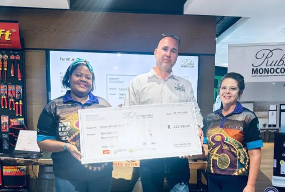 Handing over the cheque