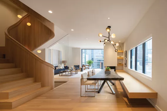 Wooden interior of a home with an impressive staircase