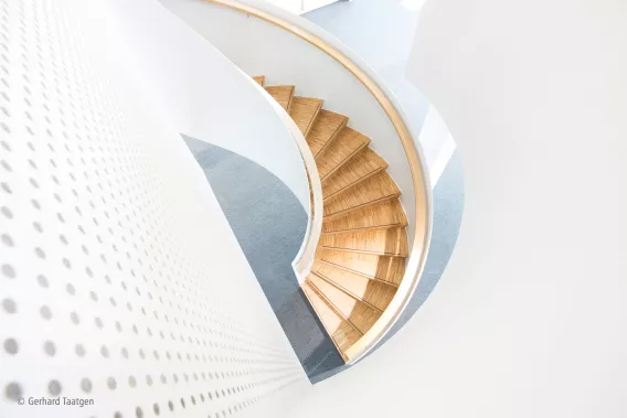 Artistic shot of a round staircase from above