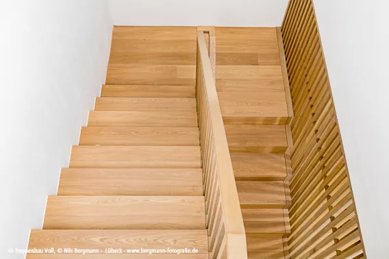Natural staircase with wooden slats shown from above