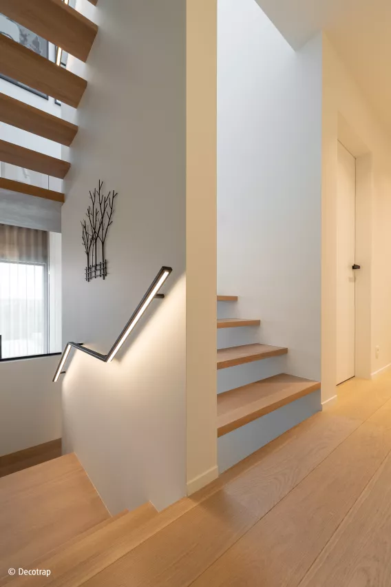 Floating staircase with handrail with LED light